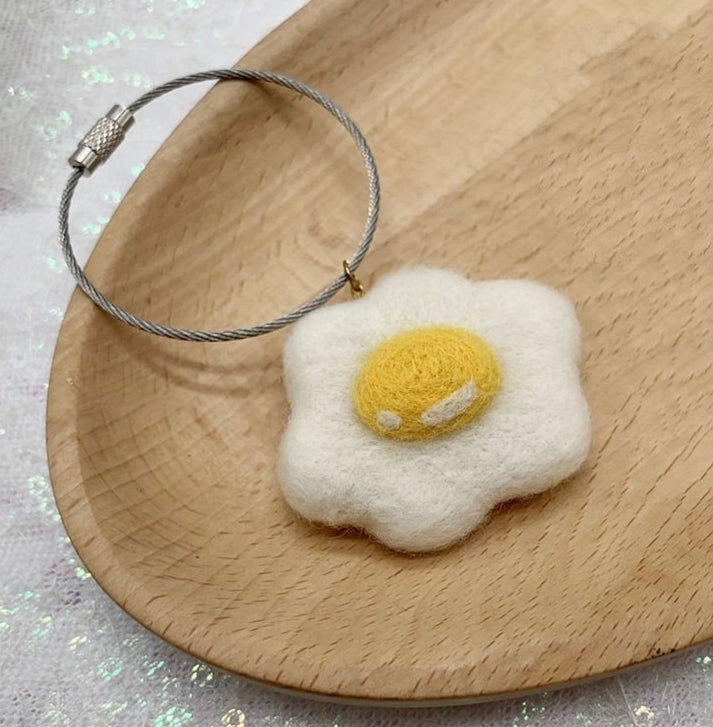 Wool felt poached egg pendant