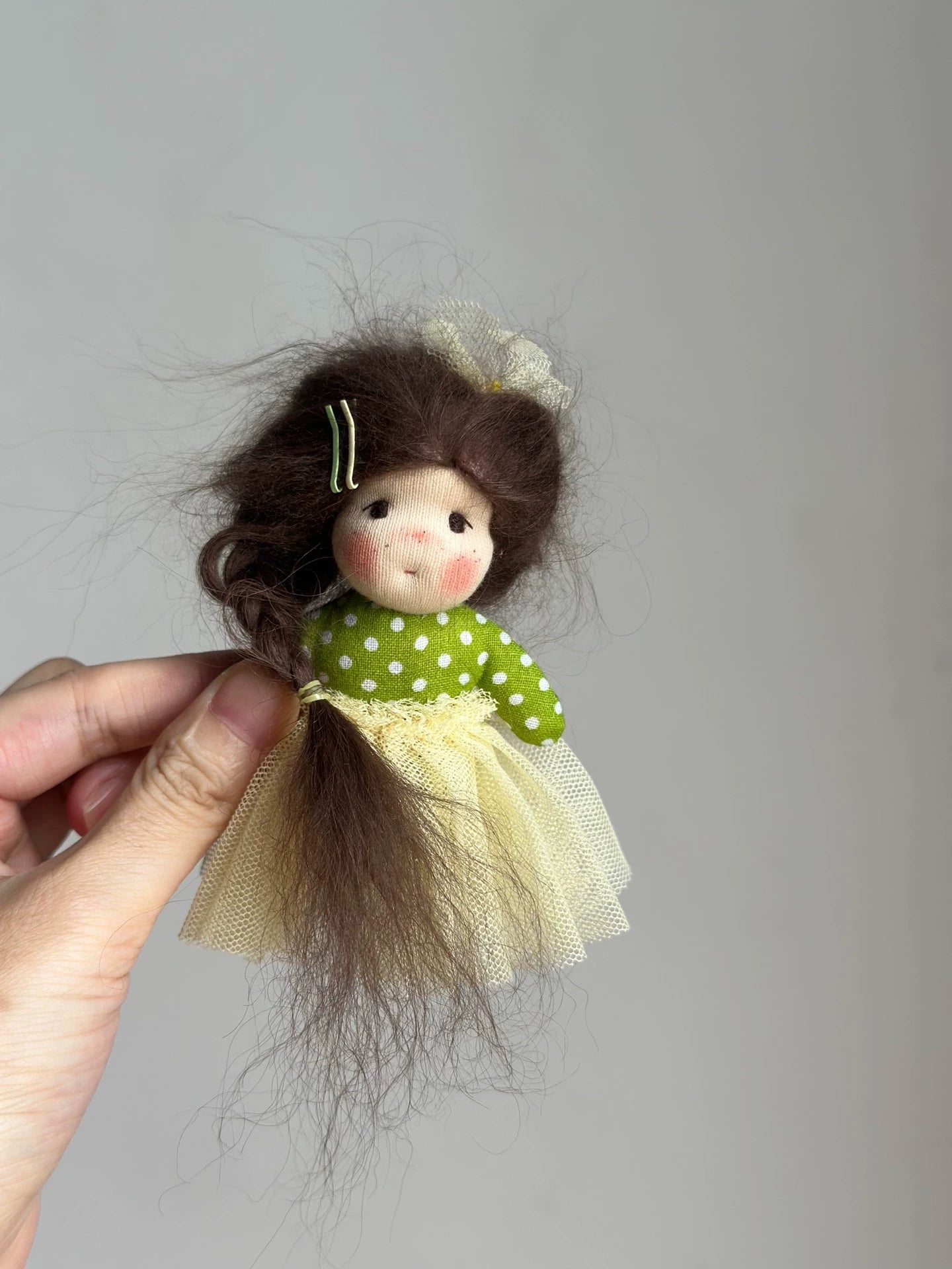 Green skirt mini doll