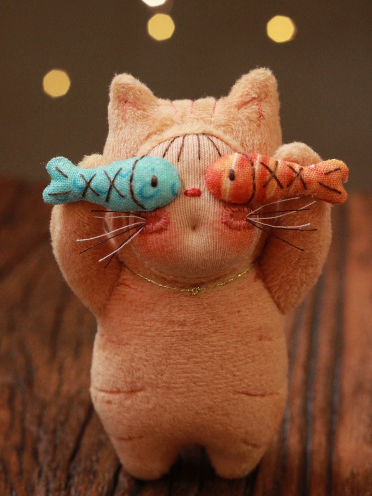 two fish orange cat