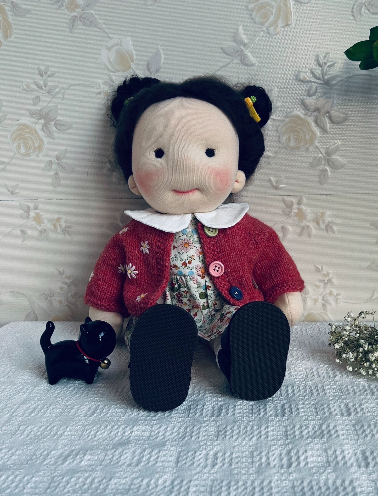 red sweater doll