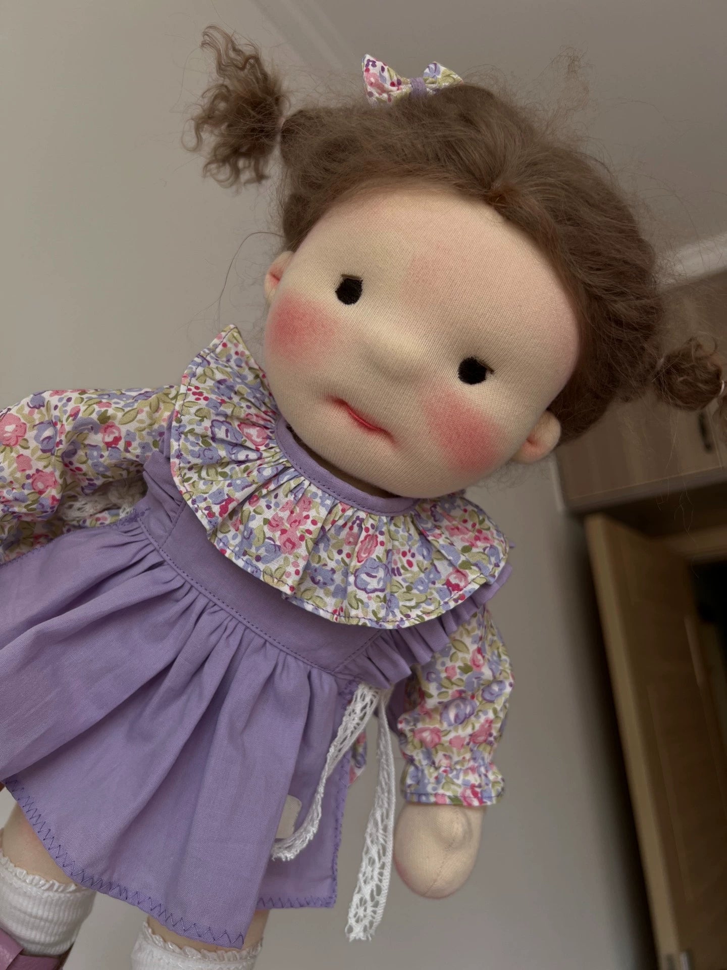 little girl in purple skirt