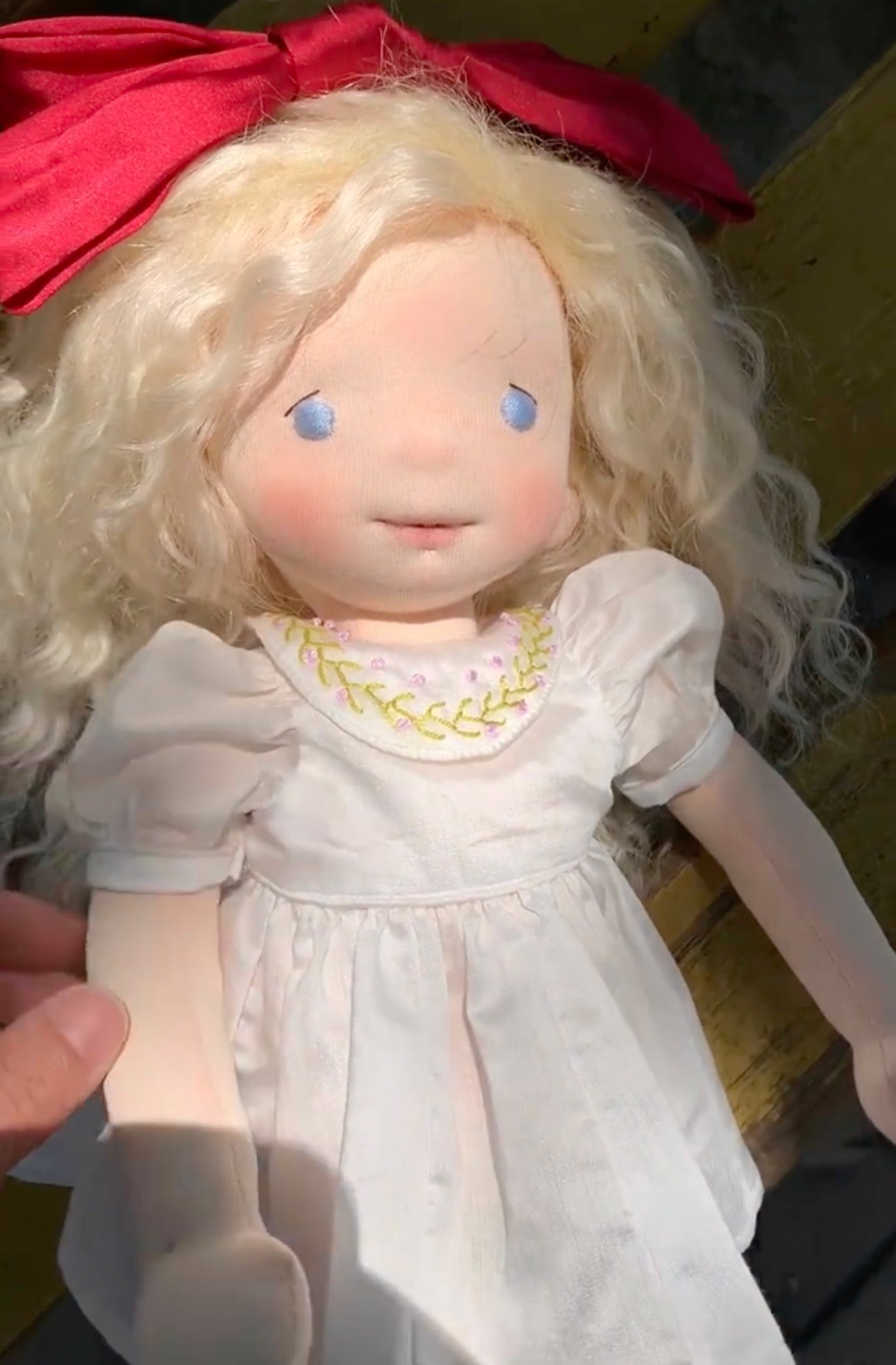 little girl with red bow
