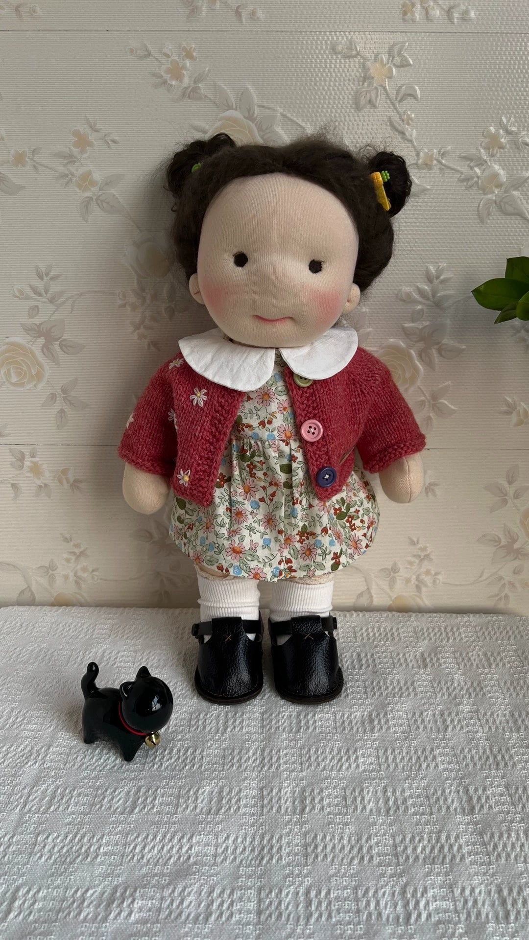 red sweater doll