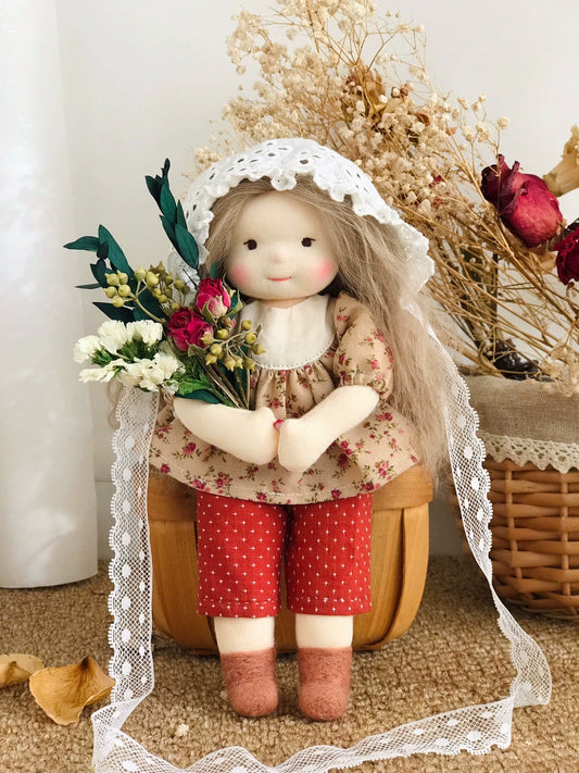 little girl holding flowers