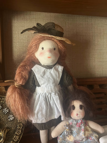little girl wearing straw hat
