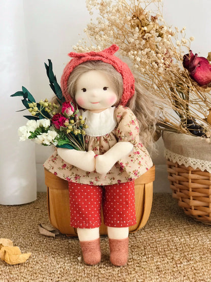 little girl holding flowers