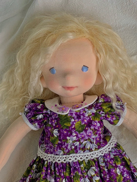 Purple skirt doll