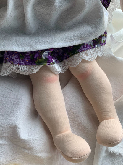 Purple skirt doll