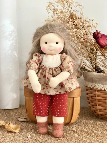 little girl holding flowers