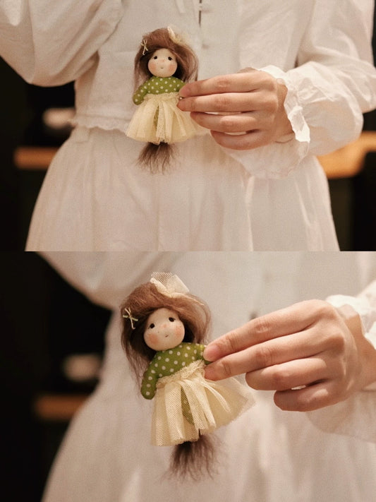 Green skirt mini doll