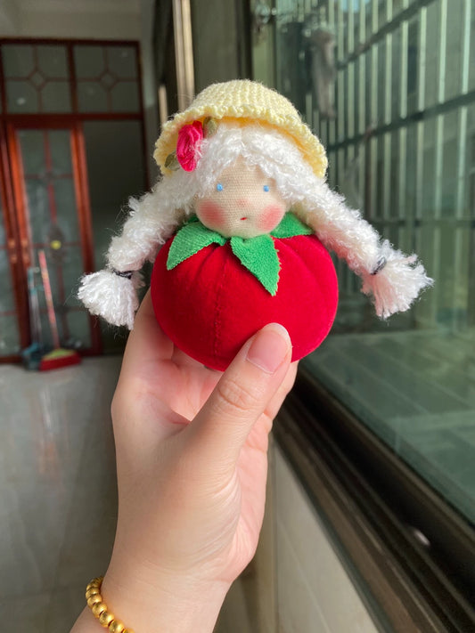 Hand-sewn tomato doll