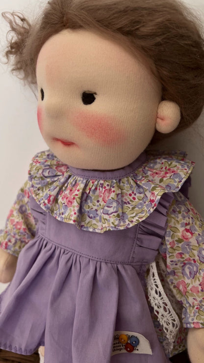 little girl in purple skirt