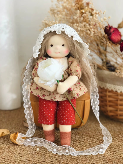 little girl holding flowers