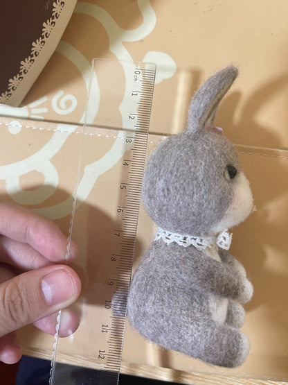 2 wool felt rabbits