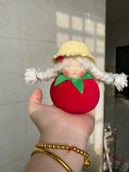 Hand-sewn tomato doll
