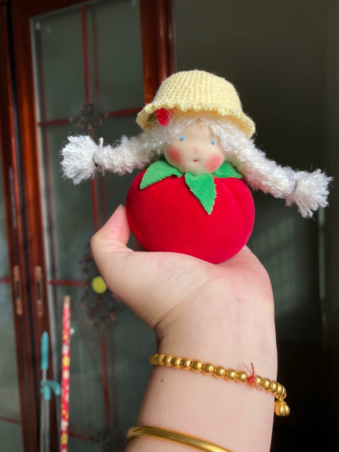 Hand-sewn tomato doll